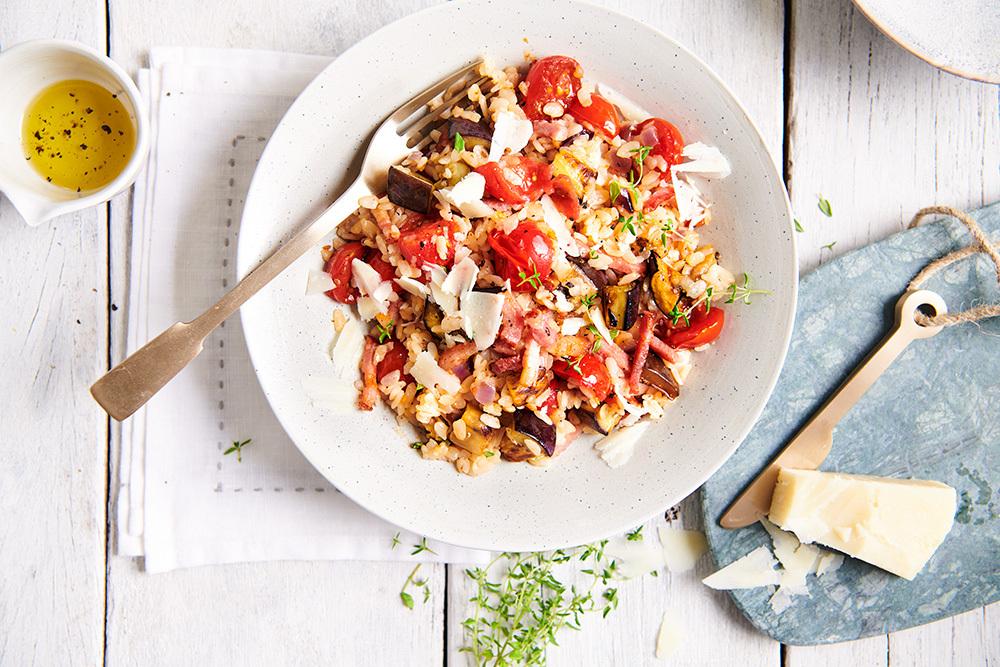 Snelle risotto met spek, aubergine, pecorino en tijm