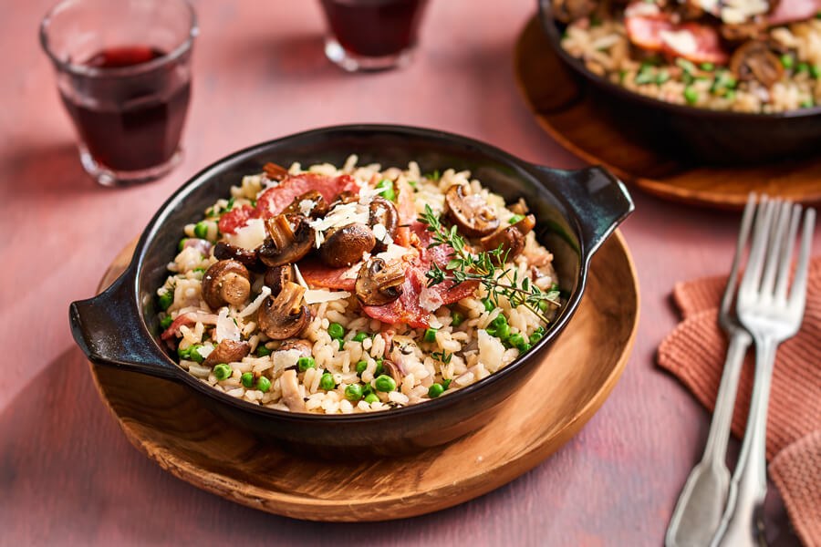 Ovenrisotto met champignons en doperwten